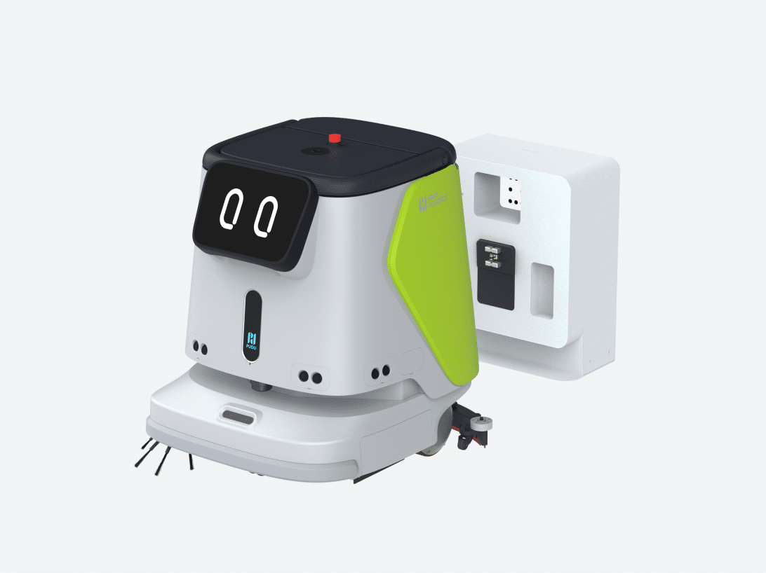 Robot docked at its charging and water station